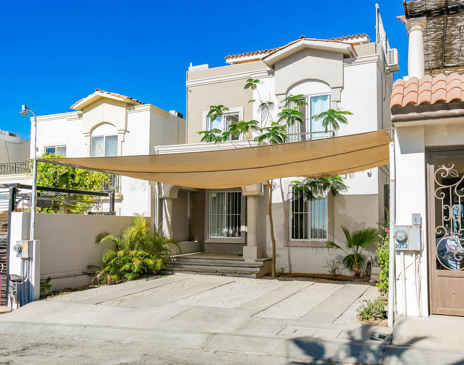 Beautiful 4-bedroom, 3-bathroom residence nestled in the highly desirable Paraiso Iguana community. This stunning two-story home offers a perfect blend of comfort, style, including a well-designed layout, spacious living and dining areas, and a nice kitchen.The home also features a new roof, a primary bedroom that boasts an en-suite bathroom and two cover parking. you'll be living conveniently near to  grocery stores, school and ,much more making it a commuter's dream. Experience the best of  living in Cabo, where community and convenience come together.