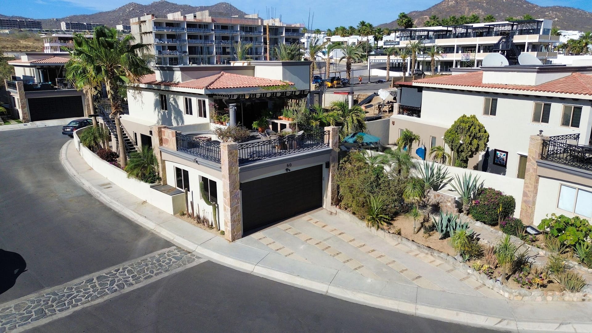 This beautifully designed 4-bedroom, 3-bathroom home in the desirable Ventanas Phase 1 community offers panoramic views of the Sea of Cortez, Land's End, and the sparkling city lights of Cabo San Lucas. Whether you're enjoying your morning coffee or hosting guests under the stars, the vistas will never get old. The main living area features an open-concept design that flows effortlessly between indoor comfort and outdoor enjoyment. Entertain with ease thanks to a well-appointed outdoor kitchen, a cozy fire pit area, and multiple terraces designed to soak in the scenery. The gourmet kitchen comes with full-size appliances and upscale finishes that make everyday living feel luxurious. The spacious fourth bedroom and a full bathroom are conveniently located on the main level, complete with a private terrace. Downstairs, the generous master suite offers a tranquil retreat with a walk-in closet, spa-like ensuite with jacuzzi tub, and direct access to a serene patio with a private pool and pergola. Two additional bedrooms on this level are well-sized and share a full bath.Practical features add to the appeal: a two-car garage with extra storage, a spacious driveway for additional parking, an 1800 KW GENERAC generator, full water purification system, and an outdoor staircase for easy access between levels.Ventanas Phase 1 offers an exceptional lifestyle with top-notch amenities including community pools, a hot tub, fire pit, kiddie park, chapel, library, boardroom, and an on-site deli for poolside snacks and drinks. You're also just minutes from Costco, restaurants, shopping, and a short 10-minute drive to downtown Cabo and the area's best beaches.