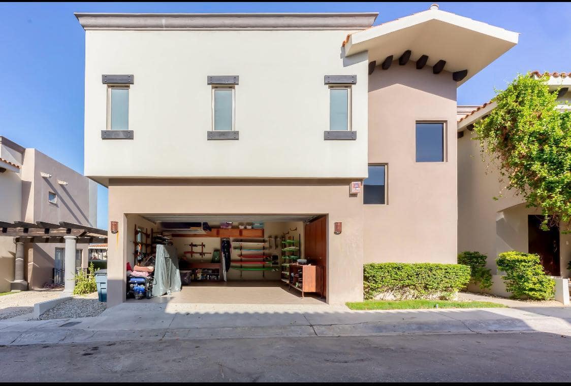 Beautifully Remodeled house appointed and furnished 3 Bedroom 2 1/2 Bathroom home hosting spectacular city views.Two ground floor Bedrooms adjoined by a Jack and Jill bathroom with ample closets space opening up to sundeck and splash pool. Laundry room and enclosed two car garage round out the first floor, 2nd floor boasts modern kitchen and island with upscale appliances joining the living area with outdoor kitchen. Master bedroom is spacious with large closet and modern bathroom. The roof top invites you to have great times with friends and family in the fire pit or in the BBQ area.