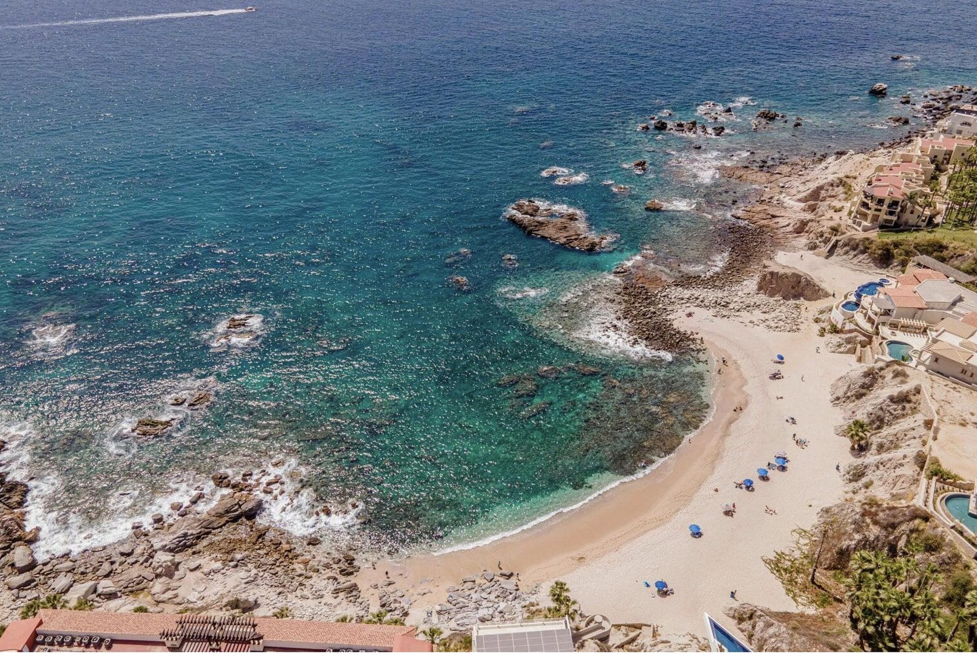 Cabo Bello is a gated community w pristine swimmable beach and convenient short distance to downtown marina w also easy access to San Jose del Cabo. There are medical services, grocery stores, fine dining, spas and top-level golf courses within minutes. World renowned Monuments surf break is just around the corner from the Cabo Bello beach.  Casa 132 is a Contemporary design 2 story home 4 bed, 5 bath w roof top terrace (Arch views) located on a prime corner lot near the entrance of the community with easy visitor parking on both streets. It includes all luxury finishes. Delivery 15 mo after contract signing and payment of 35% initial deposit.All deposits are guaranteed by the value of the land and and the progress of construction which is signed before a notary.  *Call Chrys for showings* Developers are local and can meet with buyers easily to respond any request.  Please ask for: Construction specs and calendar, full payment plan, list of fixtures, appliances and finish materials. Easy to show. Developers and builders have built multiple homes w/in the area. On the ground level you will find a large great room w/ open design living/dining arrangement which opens onto the terrace w/ jacuzzi/pool w/ baja shelf. Guest Room with an entrance from inside and outside the home which could be used as an office. Laundry, pantry and a multi-purpose room with a full bathroom. Storage area accessible from the carport which can fit 5 cars. From the foyer of the main entrance ascending a floating tread staircase arrive to an open TV/lounge area that leads to the 3 upstairs bedrooms, all of which have walk-through closets leading to full en-suite baths. Each bedroom opens on to a terrace, TV/lounge leads to a staircase to access the roof-top terrace complete with in-built bench seating, fire-pit, and counter with sink included. Outside on the ground level there is an outdoor shower, a terrace counter with in-built BBQ grill and below the infinity edge of the pool is a terrace space that can be used for addition entertaining with a gate for a service vehicle and access to additional guest parking in the cul-de-sac. The home comes equipped with all appliances, cabinetry, plumbing and lighting fixtures, Jacuzzi with heating and pool, prepared installation for solar panel (panels can be installed as an upgrade), 300 liter LP gas storage tank, 20,000 liters water cistern and pumping and pressure system included, single home sewage treatment plant, etc.Finishes: Marble flooring throughout the house, terraces and counter tops in bathrooms. Granite counter tops in kitchen. Alder wood or similar cabinetry in kitchen & closet. Pebble Tec pool finish, natural stone on building facade. Electric vehicle charger included.Full turn-key furniture package available through developer at cost upon request.