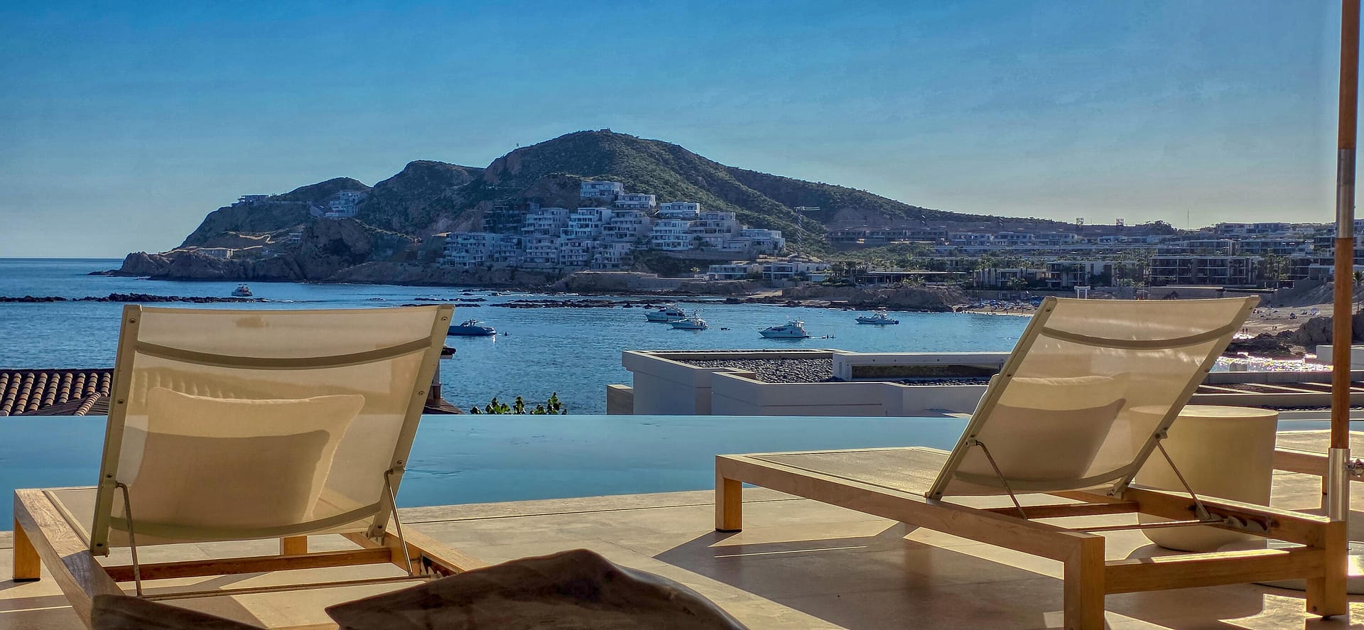 Located within the ultra-private Chileno Point enclave, Residence 105 presents a rare opportunity to own a pristine, fully furnished, turn-key contemporary estate in the most coveted address of Chileno Bay Golf & Beach Club. This two-story masterpiece offers permanently protected panoramic views of Chileno Bay, its reef, and the seasonal migration of Gray and Humpback whales. Expansive glass walls open to an ocean-facing terrace with infinity pool, spa, fire features, and landscaped yard. Just moments from the Beach Club, ownership includes the rare ability to acquire and transfer Chileno Bay Club Membership with privileged access to 2 championship Tom Fazio golf courses, lighted short course, private beach clubs, spa, dining, amazing water park, fitness, and family resort amenities.