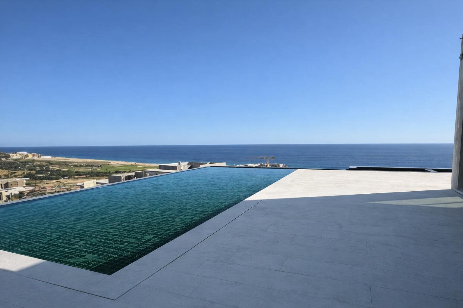 Welcome to Estate Lot 29 at Cielo Marbella, an exceptional luxury residence located within the gated community of Quivira Los Cabos Directly next to ST Regis Residences. A Thoughtfully designed home with quality finishes and a functional layout including views from every bedroom, this residence will be ready for move-in within 60 days. This home features five spacious bedrooms, each with its own en-suite bathroom, along with a private office with a half bath and a comfortable TV room. The open living areas connect seamlessly to a large covered terrace, perfect for entertaining or relaxing, and include an infinity pool that enhances the indoor-outdoor lifestyle. The property also offers a three-car garage and access to all Quivira amenities, including the golf course, beach club, and gym