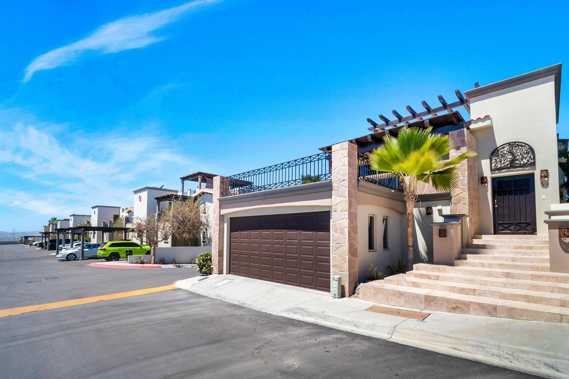 Experience upscale living at Casa Perla, a stunning corner Casa Grande in Ventanas Phase 1 with sweeping views of the blue Sea of Cortez, the iconic Arch, and city lights. This beautifully designed home features an open-concept living area with vaulted ceilings and an office space that can serve as an additional sleeping area. Pocket doors open to a spacious terrace with grill and wet bar, perfect for entertaining while enjoying the views. All three bedrooms are privately located on the ground level for comfort and tranquility. The home also offers direct garage access and a spectacular rooftop terrace with breathtaking 360 panoramic views. Located within Ventanas, a community known for excellent amenities and quality living, Casa Perla is ideal as a full-time residence/ rental investment